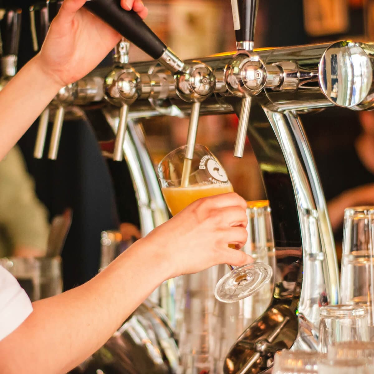 Hospitality scene with food, drinks, and customers